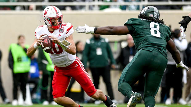Heinrich Haarberg pressured by Michigan State 2023 USATSI_21816553